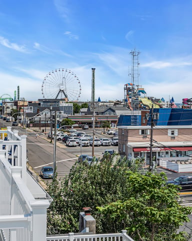 Rooftop view of Seaside Heights boardwalk and Ferris wheel